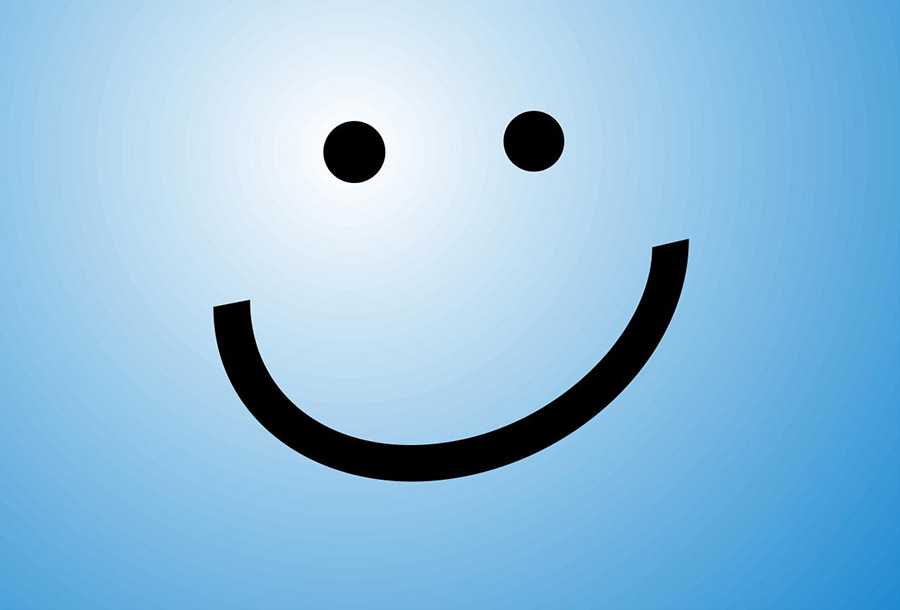 Logo Blue Screen - Ein grosses Smilygesicht auf einer großen blauen Fläche.